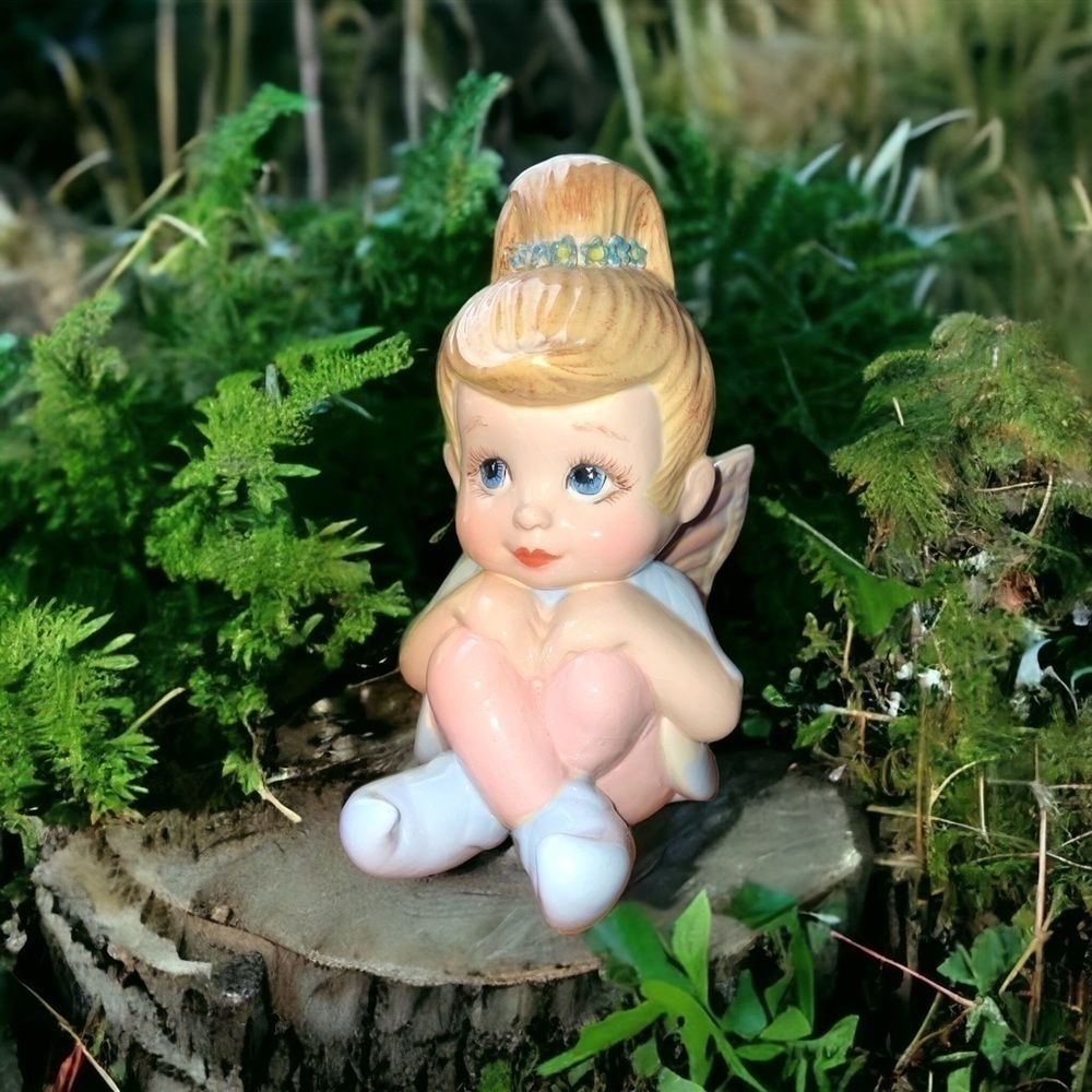 baby Tinkerbell porcelain figurine, no markings, adorable,about 6 inches tall